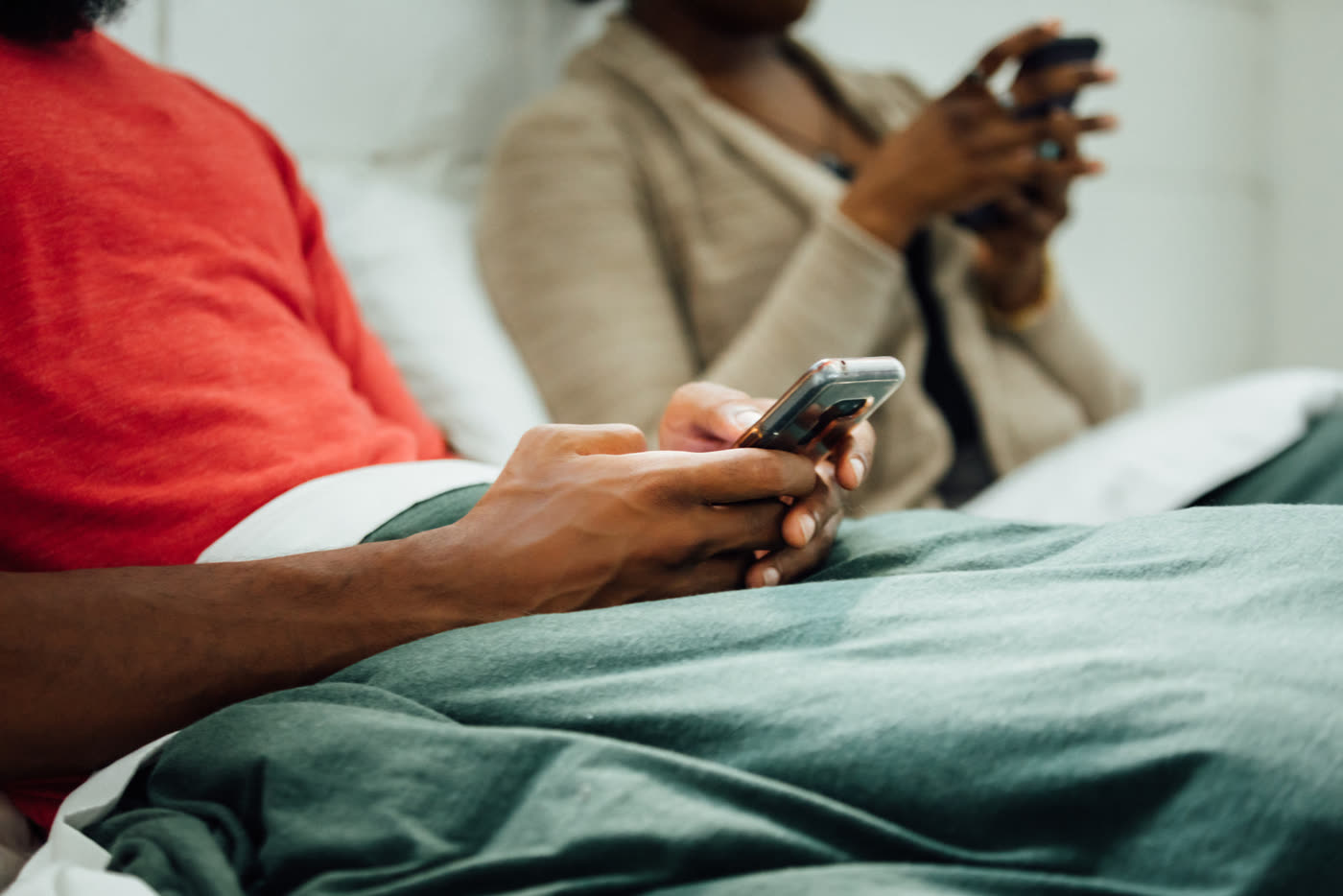 A customer on her phone at home